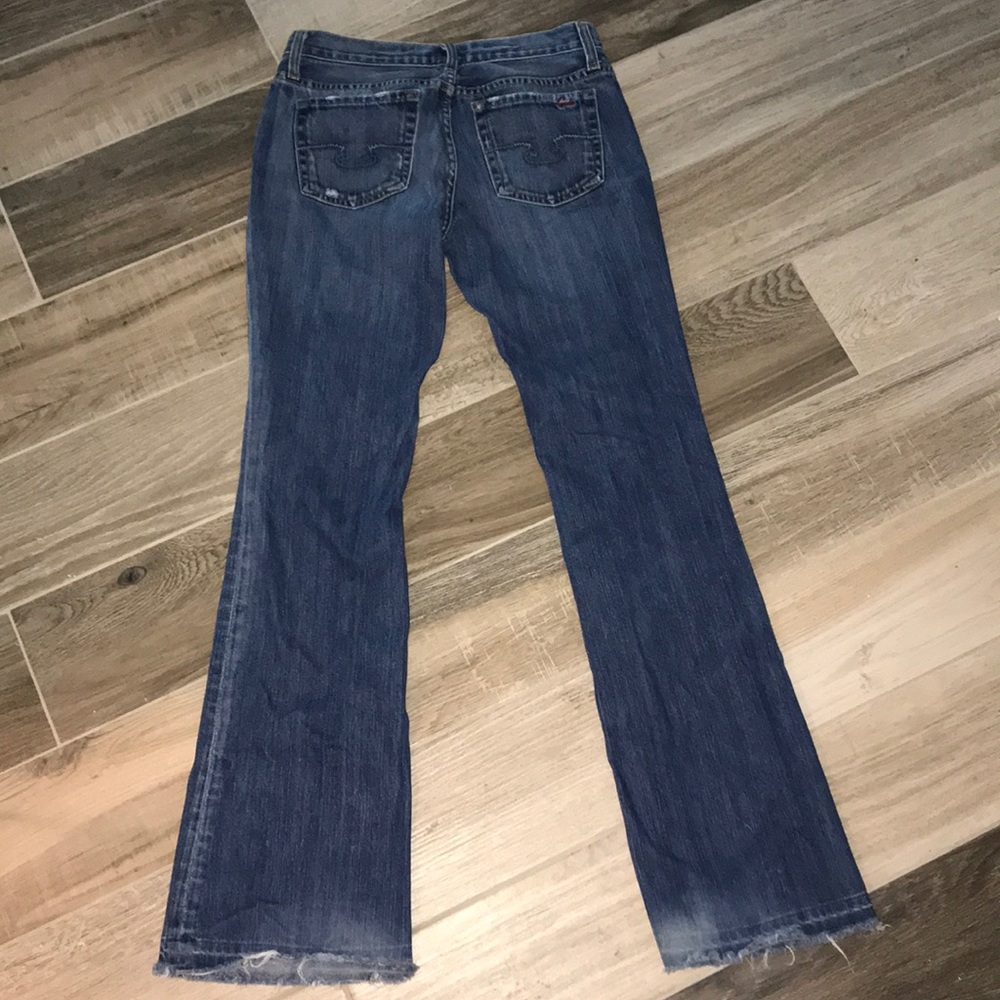 Slightly distressed BLUE CULT  bootcut  jean Sz 28